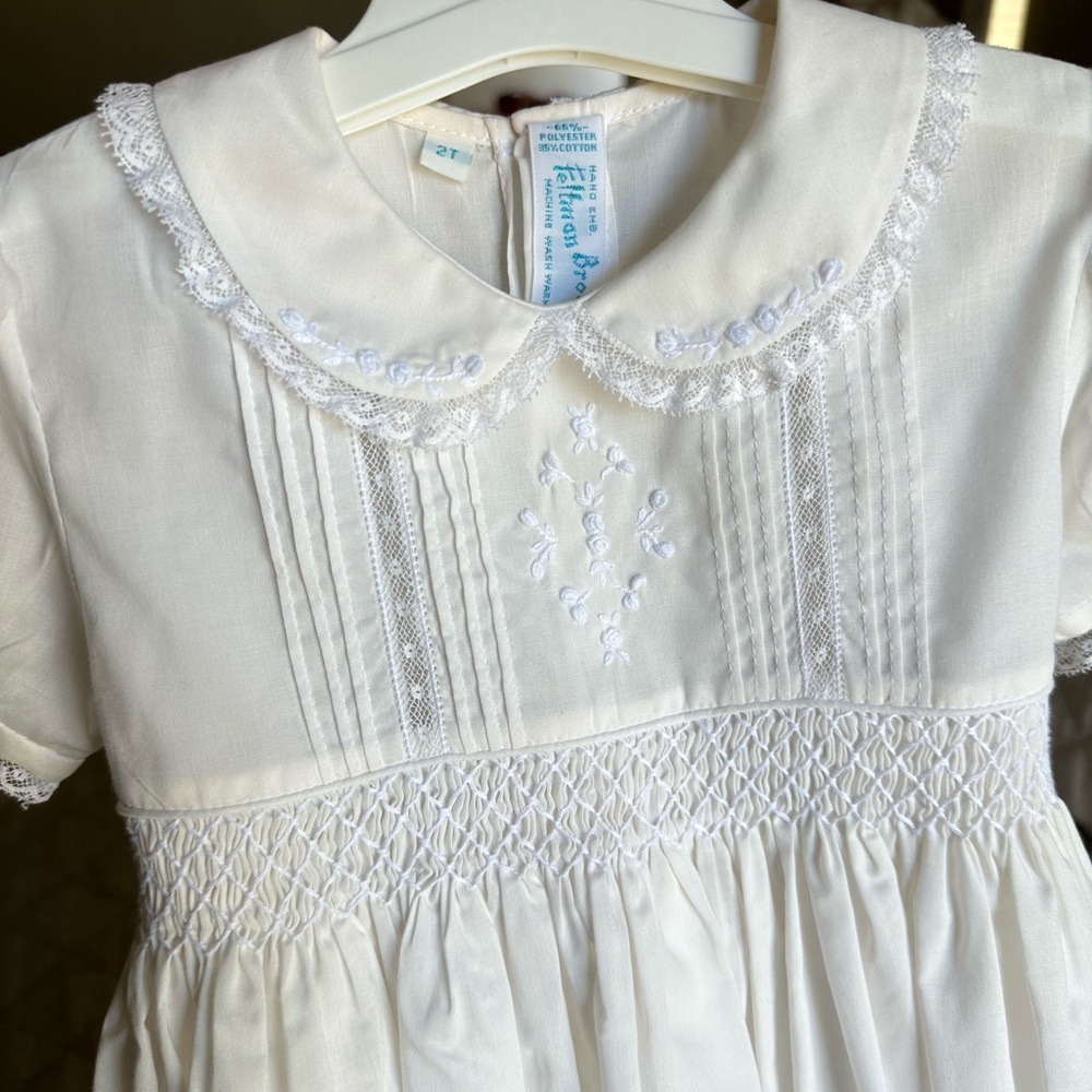 Elegant White Baby Dress with Embroidered Details